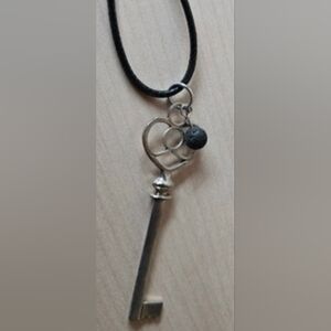 Silvertone Key Pendant Aromarherapy Necklace